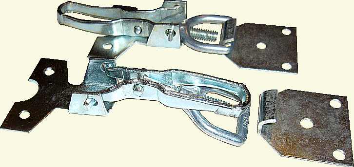 Latch in closed and open configurations, viewed obliquely