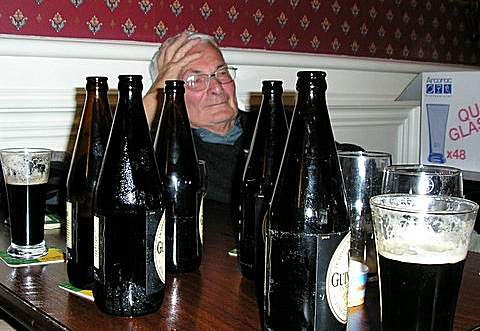 John Getty behind an excess of bottles, Photo... Chris Slade 2005