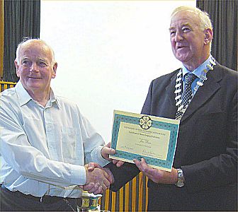 Jim receiving his certificate