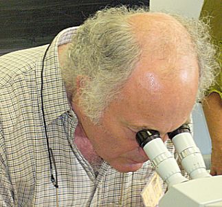 Roger Patterson at the microscope